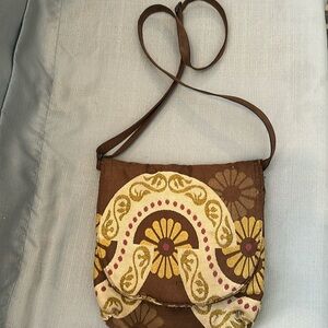 Sally Spicer, San Francisco, Crossbody bag. Brown gold and pinks.